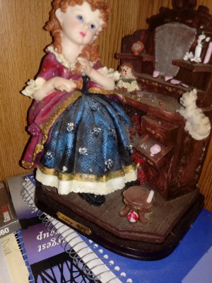 Identifying an Ashley Belle Figurine - woman in period clothing sitting at t makeup table