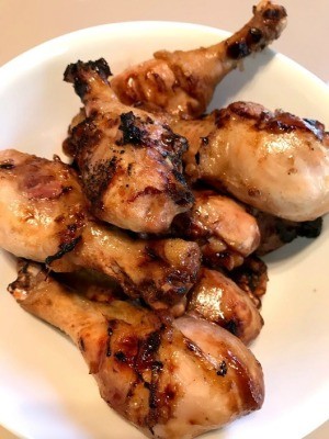 finished Grilled Citrus Soy Chicken Drumsticks on plate