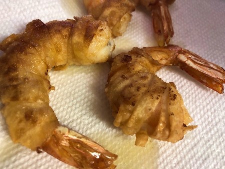 fried shrimp on paper towel