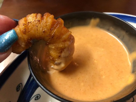 dipping Shrimp in sauce