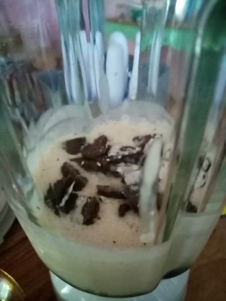 Cookies added to cream in blender