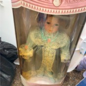Value of a Collectible Memories Porcelain Doll - doll in box