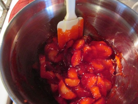 sliced strawberries mixed with glaze