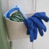 Bucket Garden Storage - newly painted pail on side of garden shed with seed packet and garden gloves inside