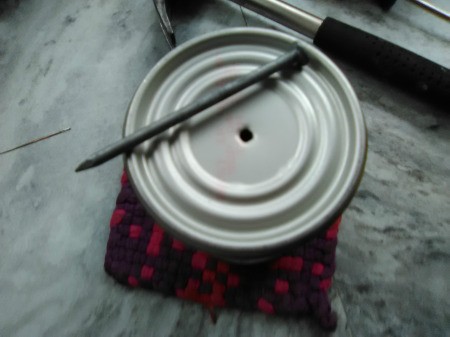 Up-cycled Seedling Pots - one in the center of can will also work