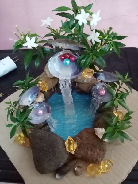 Pearl Water Falls Centerpiece - add artificial plants and flowers