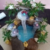 Pearl Water Falls Centerpiece - add artificial plants and flowers
