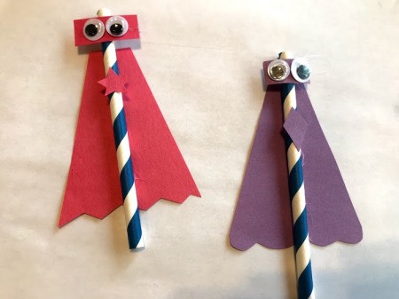 Making Super Hero Straws - glue capes to straws and then the other pieces as shown in photo