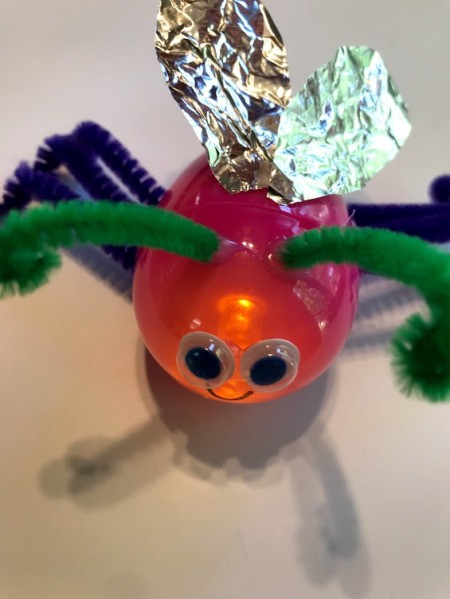 Plastic Egg Fireflies - firefly with light facing forward, closeup