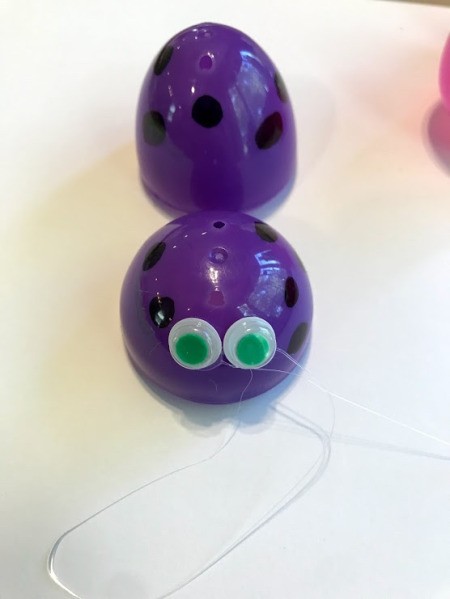 Plastic Egg Spider Craft - glue on the eyes