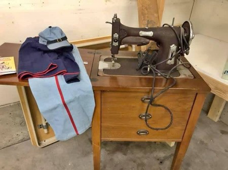 Advice for Choosing a Vintage Sewing Machine - vintage Domestic sewing machine in a cabinet