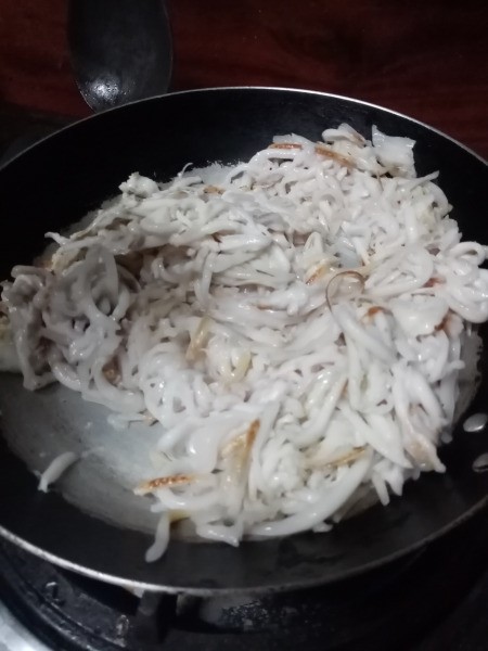 coconut meat in pan