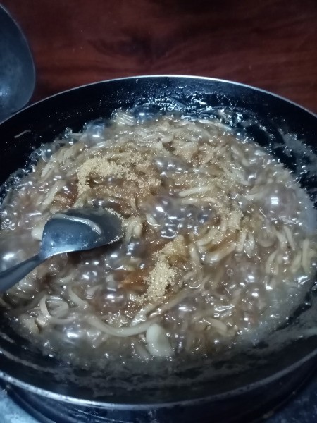 stirring ingredients in pan