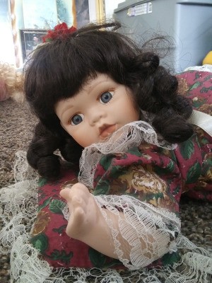 Identifying a Porcelain Doll - doll lying on stomach