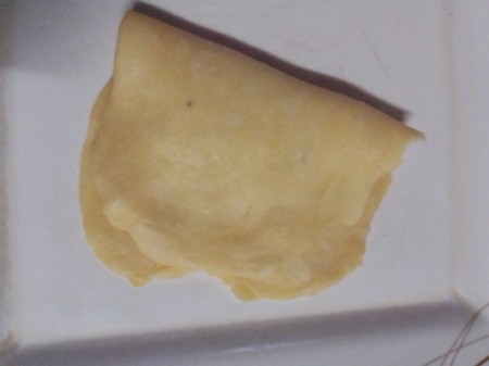 folded dough over mango