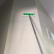 Using a Swiffer to Clean Walls - wiping down walls with a Swiffer dry floor duster