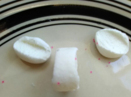 Marshmallow Peepsters - cut the ends off the third marshmallow into slivers and shave the ends off to expose a sticky edge