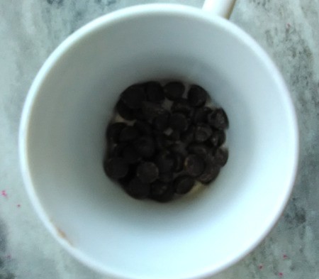 Marshmallow Peepsters - add chocolate chips to a microwave bowl