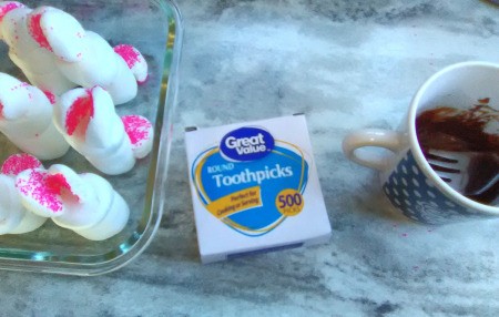 Marshmallow Peepsters -  use a toothpick to paint on features using the melted chocolate