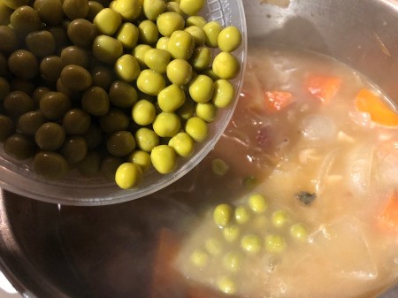 adding peas to pot