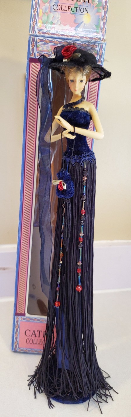 Identifying a Cathay Collection Porcelain Doll - tall slender doll in fancy dress and hat