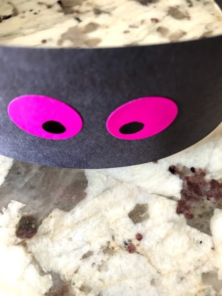 Paper Spider Hat - add eyes using Sharpie