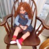 Identifying a Porcelain Doll - red headed doll wearing red sneakers