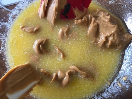 mixing butter & peanut butter in bowl
