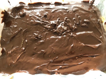 adding Chocolate to top of pan