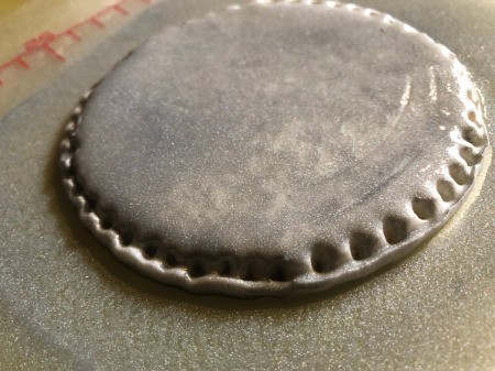 DIY Turntable Cake - use tip of a round chopstick to decorate the edge and then spray silver