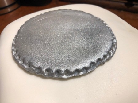 DIY Turntable Cake - attach the turntable platter to the cake at the top left, using some buttercream frosting