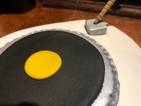 DIY Turntable Cake - spray a Starburst with silver cake spray and press into the top right, make a small hole using a chopstick