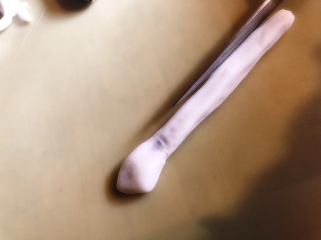 DIY Turntable Cake - roll the Pocky in the fondant and create a head and needle shape