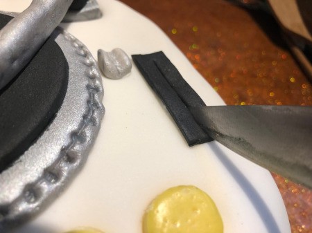 DIY Turntable Cake - add details such as pitch control and tonearm holder using fondant