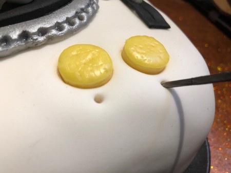 DIY Turntable Cake - use sharp skewer to poke holes below th knobs and the pitch control