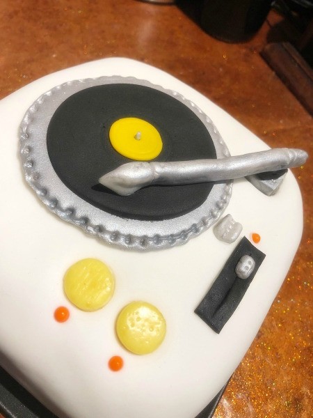 DIY Turntable Cake - drop in little orange sugar balls to serve as lights