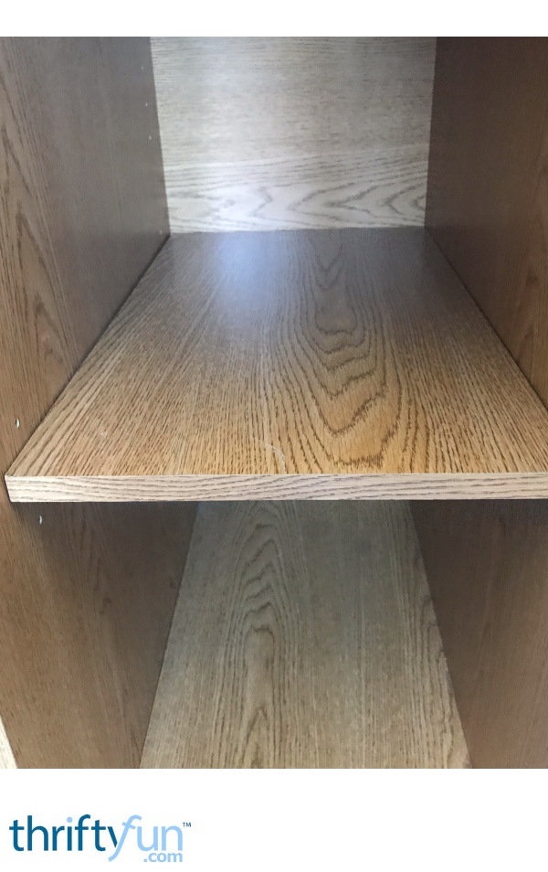 Using a Screw as a Missing Shelf Peg | ThriftyFun