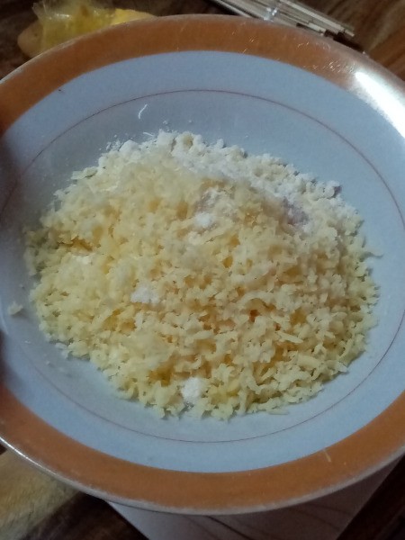 grated cheese  & dry batter in bowl