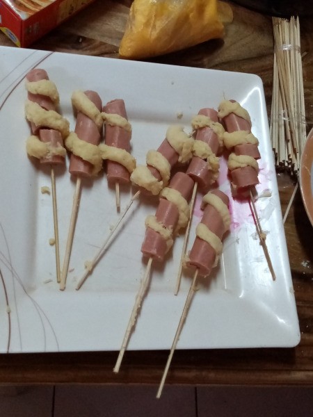 dough wrapped around sausage