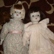 Identifying Two Musical Porcelain Dolls
