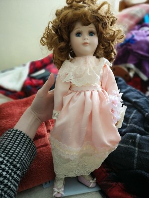 Identifying Porcelain Dolls - pink and white lace dress