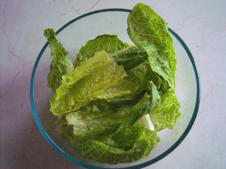 A bowl of freshly washed lettuce.