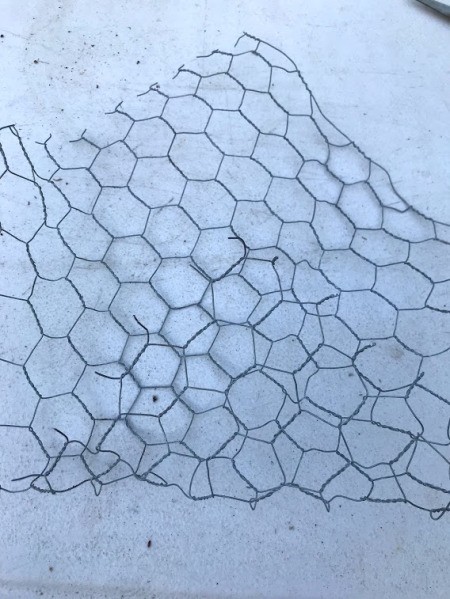 DIY Hanging Envelope Planter - fold into an envelope shape with three corners to the middle, bottom first