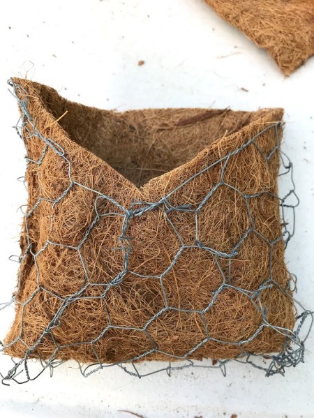 DIY Hanging Envelope Planter - trim excess off the liner so you can see the envelop shape