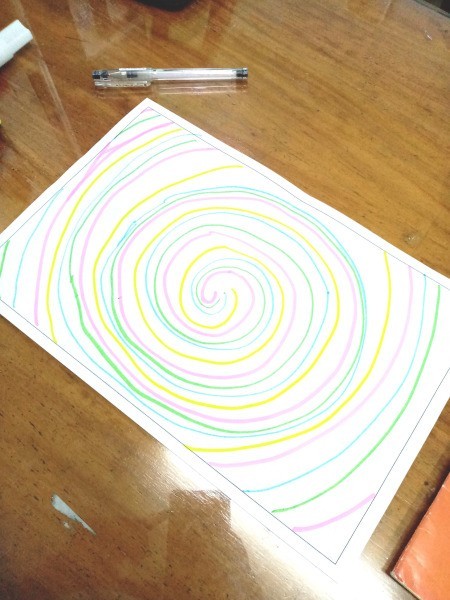 Tie Dye Notebook Cover - create layers of the spiral using different colored markers