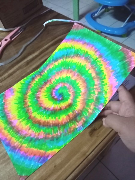 Tie Dye Notebook Cover - glue the tie dye paper down and trim excess