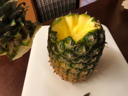 diagonally cut Pineapple top removed