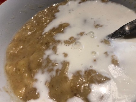 adding milk to bananas
