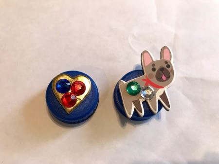 How to Make a Bottle Cap Necklace for Toddlers - hot glue the gems in place