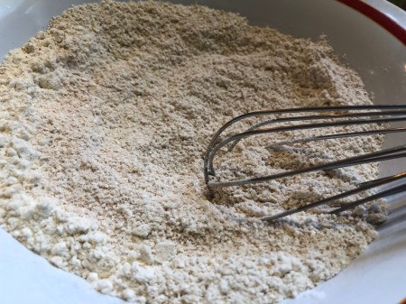 mixing ground oatmeal with sugars